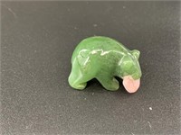 Alaskan Kobuk jade carved bear who has caught a la