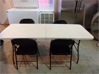 6 Foot Folding Plastic Table with 4 Tan Chairs