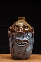 Blue and Brown Face Jug by Billy Joe Craven