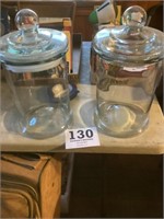Two large storage jars with lids