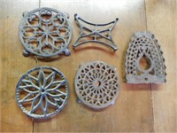 5 OLD CAST IRON TRIVETS