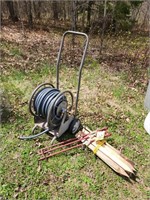 Hose on reel, 30" earth anchors (3) & wooden .....