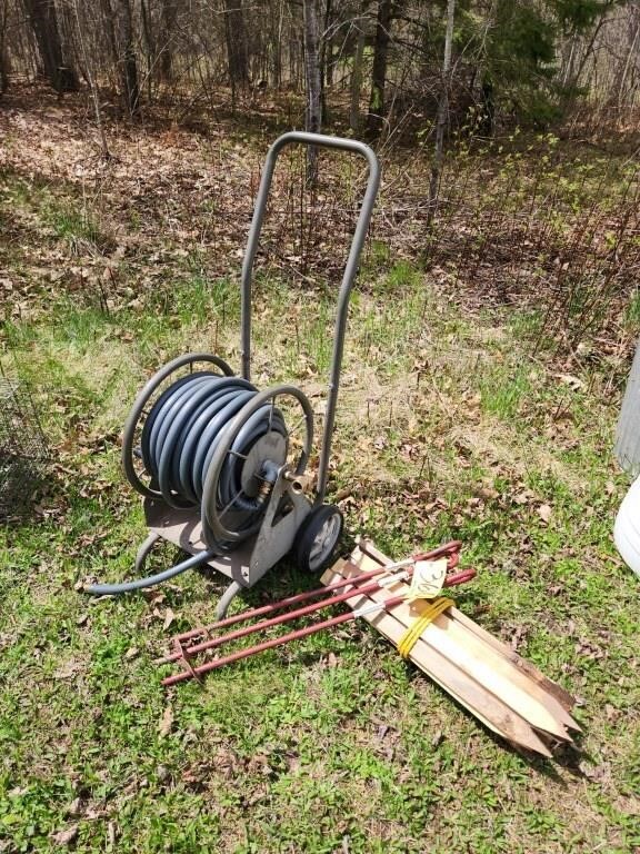 Hose on reel, 30" earth anchors (3) & wooden .....