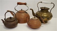 Four copper and brass kettles / teapots
