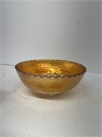 Carnival glass bowl with windmill design