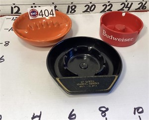 Vintage plastic ashtrays- 1-orange, 1- St. Luke's