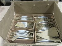 Box of white saucers