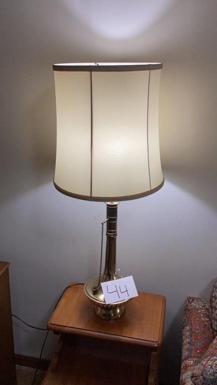 Accent lamp measures approximately 3 feet tall
