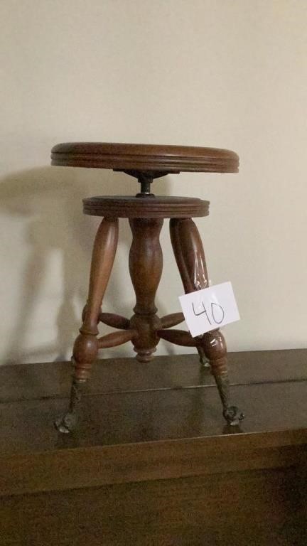 Wooden swivel stool measures 20 inches tall seat