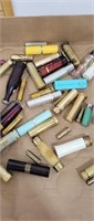 Large lot of vintage lipstick and containers