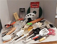 Kitchen utensils in 18 quart dish pan