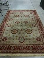 Machine-made beige floral rug