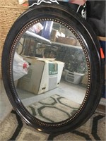 28” tall x 22” wide oval mirror