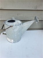 Vintage galvanized watering can