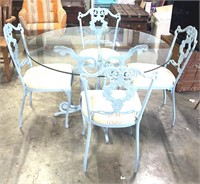 Very nice glass top table with 4 metal chairs and