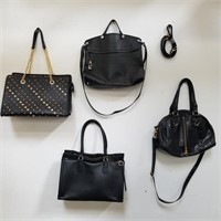Group of designer style purses