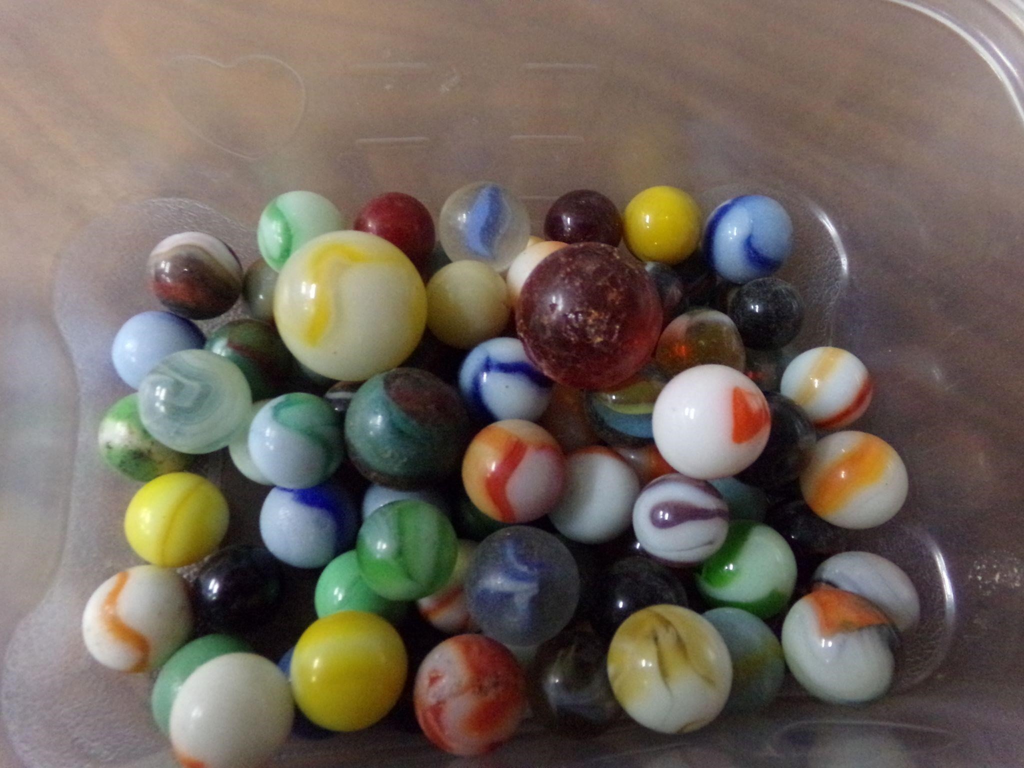 75 old marbles