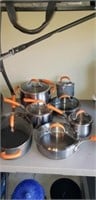 7 piece set orange handle Rachael Ray pots