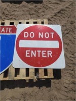 Pallet with "Interstate 5" & "Do Not Enter" Signs