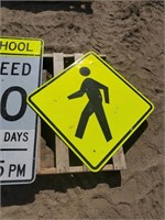 Pallet with "Pedestrian" & "School Zone" Signs