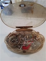 Acrylic container of estate jewelry