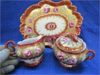 antique porcelain sugar-creamer set on tray