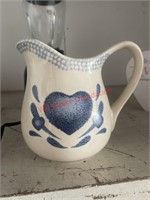 Decorative pitcher or planter  (garage)