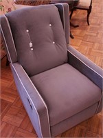 Rocking swivel recliner with gray upholstery
