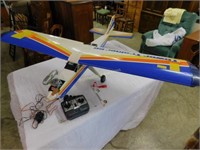 RC model airplane w/O.S. MAXFP eng & 4010 muffler