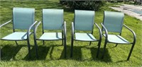 Four stackable patio chairs