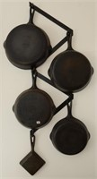 CAST IRON GRISWOLD PAN SET WITH HANGER