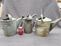 Vintage galvanized water cans and 1 Four Quart