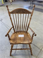 Ornate carved captains chair