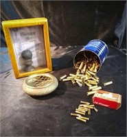 Brass ashtray, 22 bullets ( not a full box ), can
