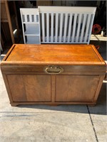Heavy ornate trunk with brass handles