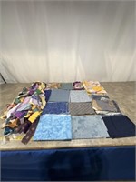 Assortment of fabric cuts, started projects, quilt