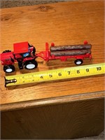 toy tractor and log trailer