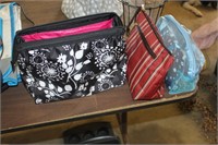 2 cosmetic case w/ feminine products and nail h