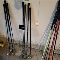 G308Four golf clubs Woods