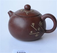 Chinese Yixing teapot with raised prunus
