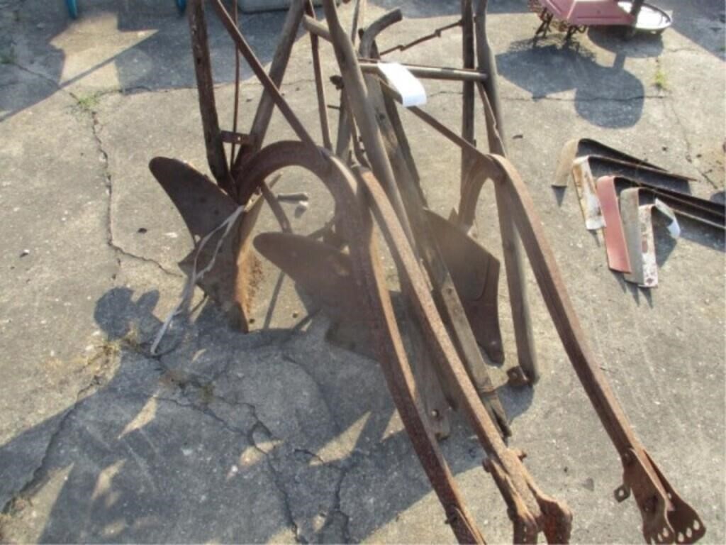 3 old horsedrawn plows