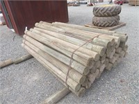 Assorted 8' Treated Round Wood Posts