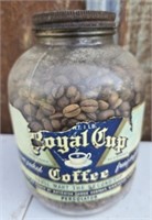 Vintage glass jar of royal cup coffee beans