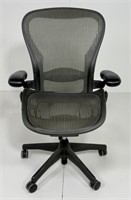 Office chair, swivels & adjusts, mesh seat and