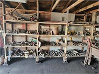large group of metal tractor parts of all kinds
