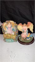 2 angel figurines