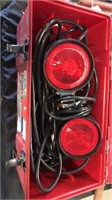 Tow lights in red case