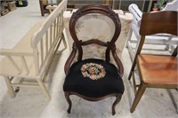 Mahogany carved chair with needle point seat