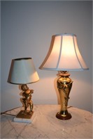 Two cast metal table lamps depicting figures