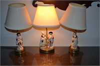 3 table lamps having English porcelain figures on